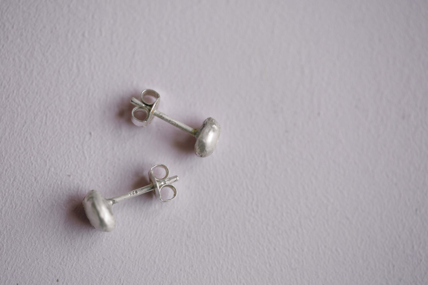 Mismatched Pebble Stud Earrings in Silver - Be. Alice